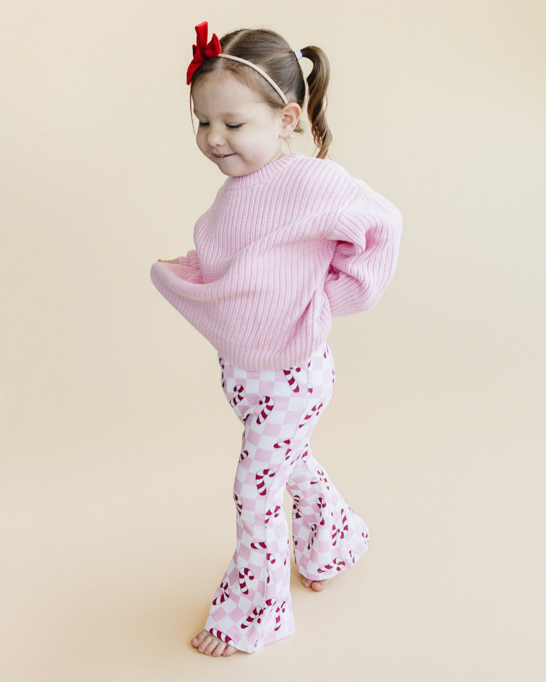 Girls Checkered Candy Cane Flare Pants | Pink
