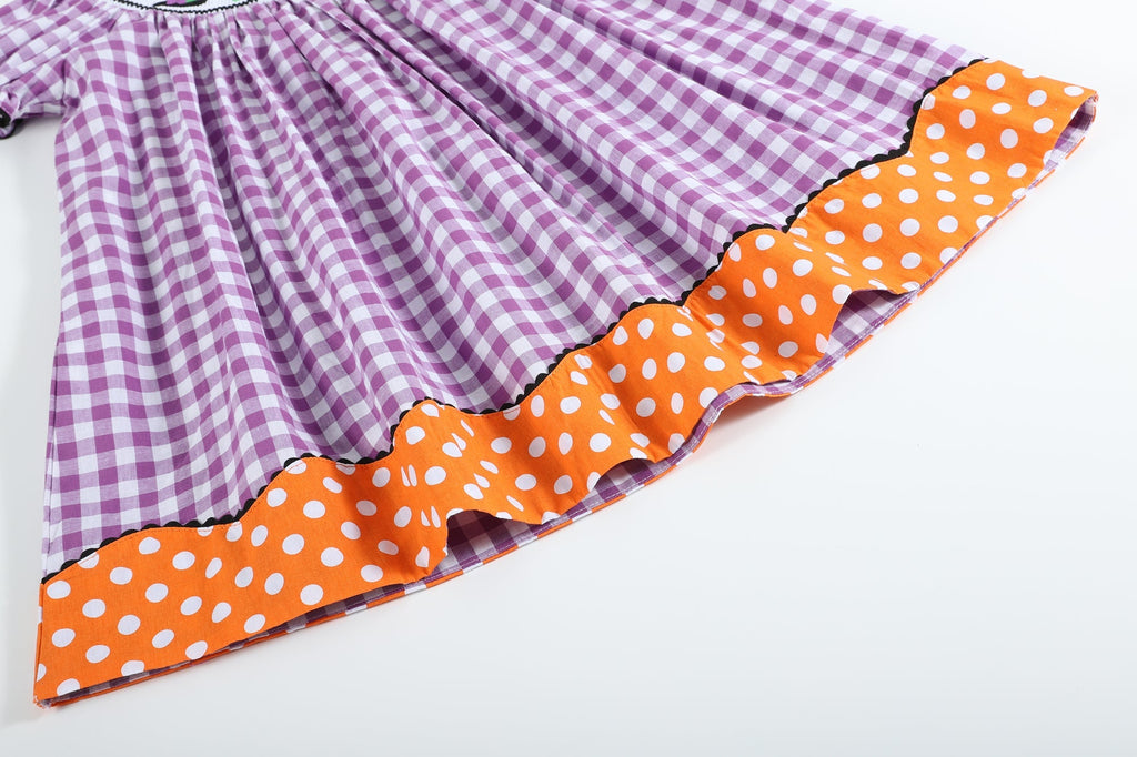 Girls Purple Gingham Halloween Boo Smocked Bishop Dress - close up of bottom hem lil cactus