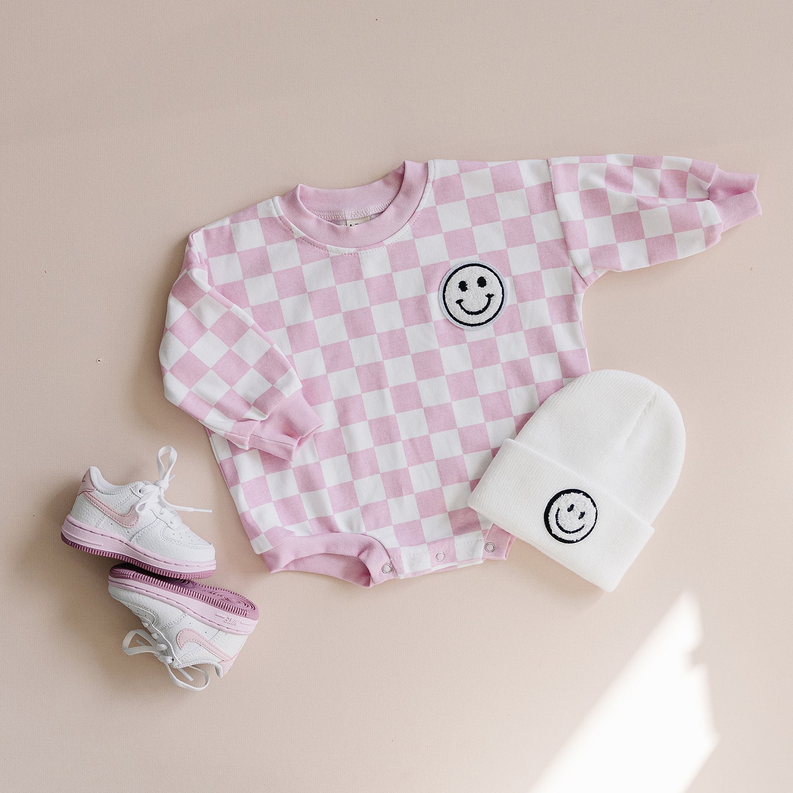 Checkered Smiley Pink Bubble Romper