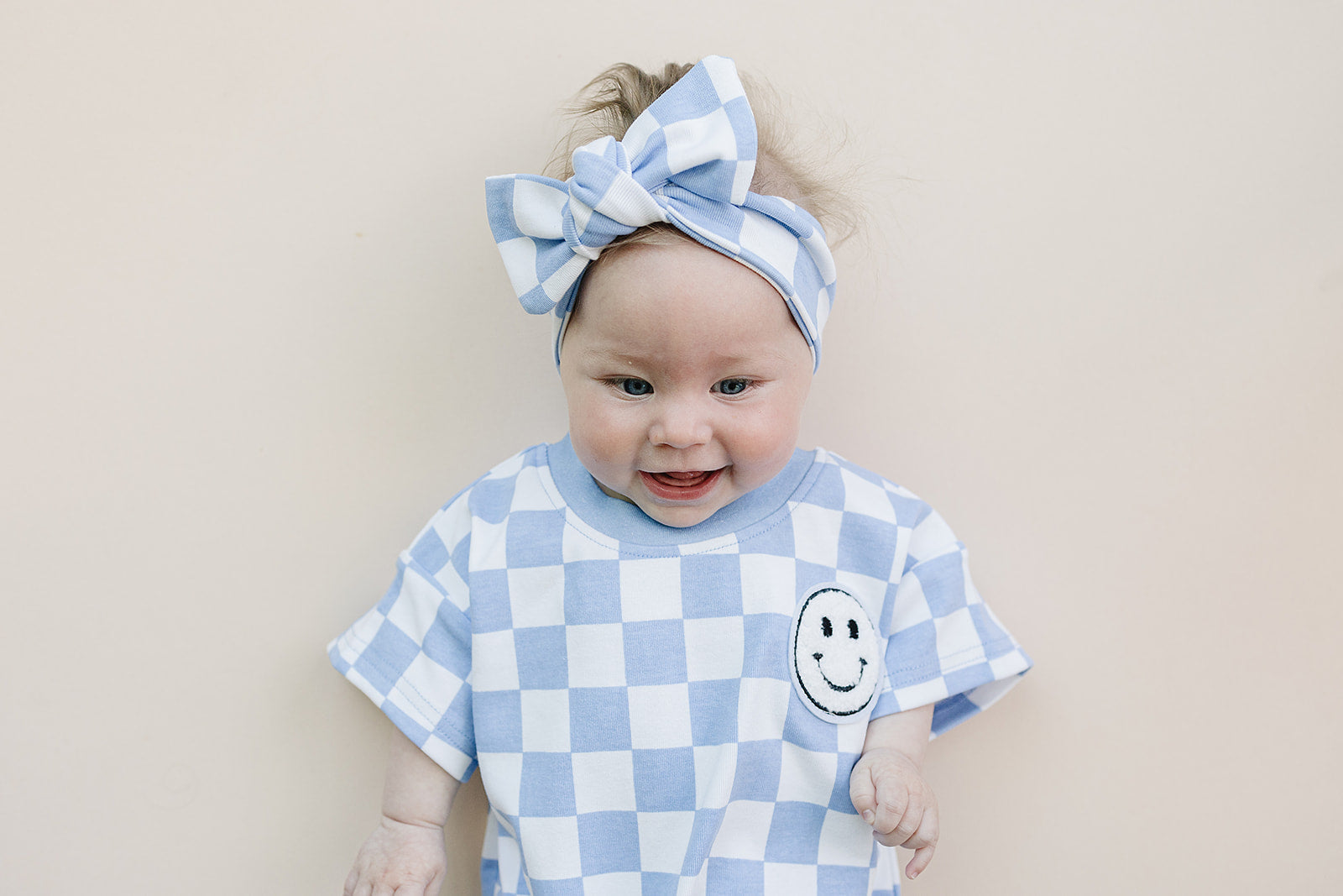 Checkered Smiley Blue Short Sleeve Bubble Romper
