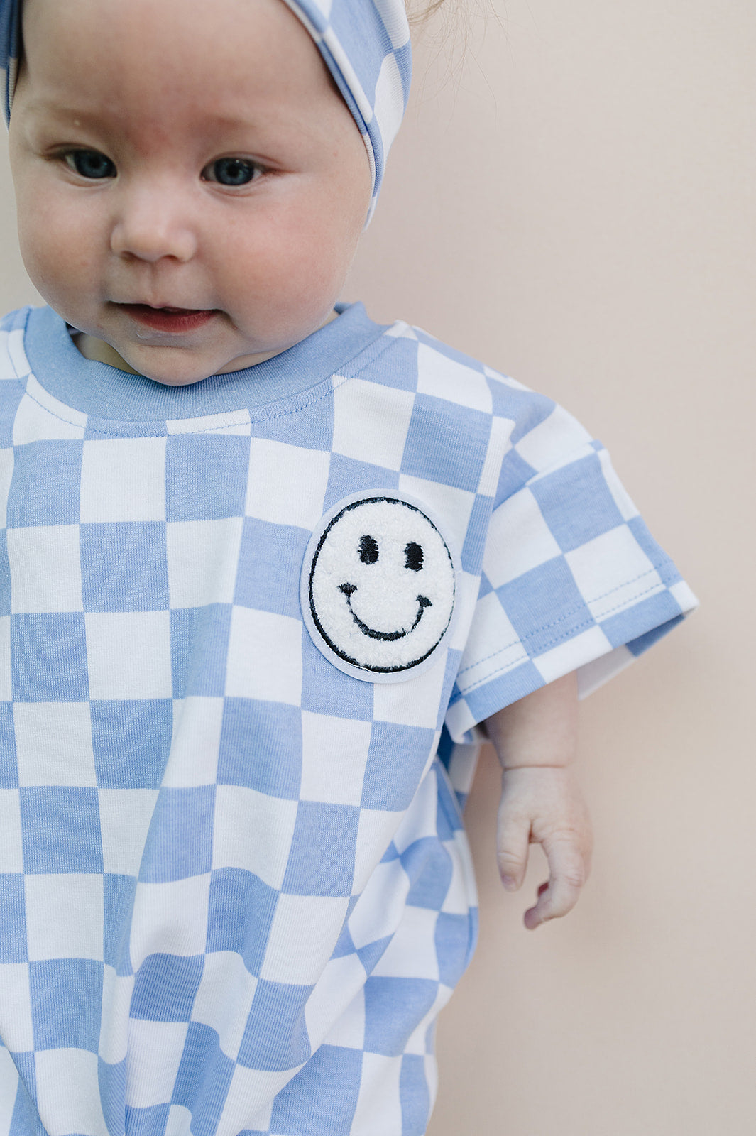 Checkered Smiley Blue Short Sleeve Bubble Romper