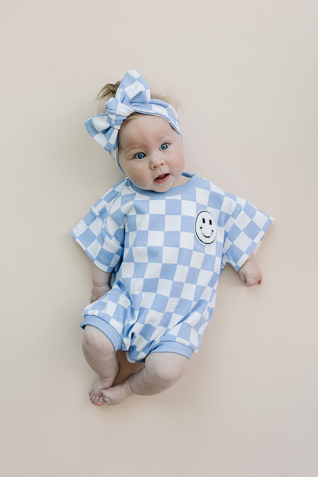 Checkered Smiley Blue Short Sleeve Bubble Romper
