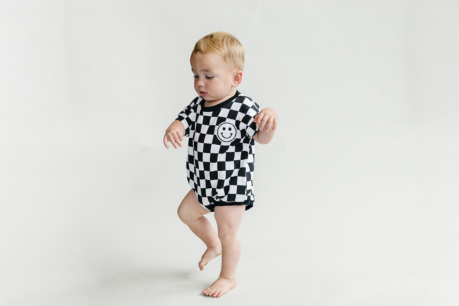 Checkered Smiley Black Short Sleeve Bubble Romper
