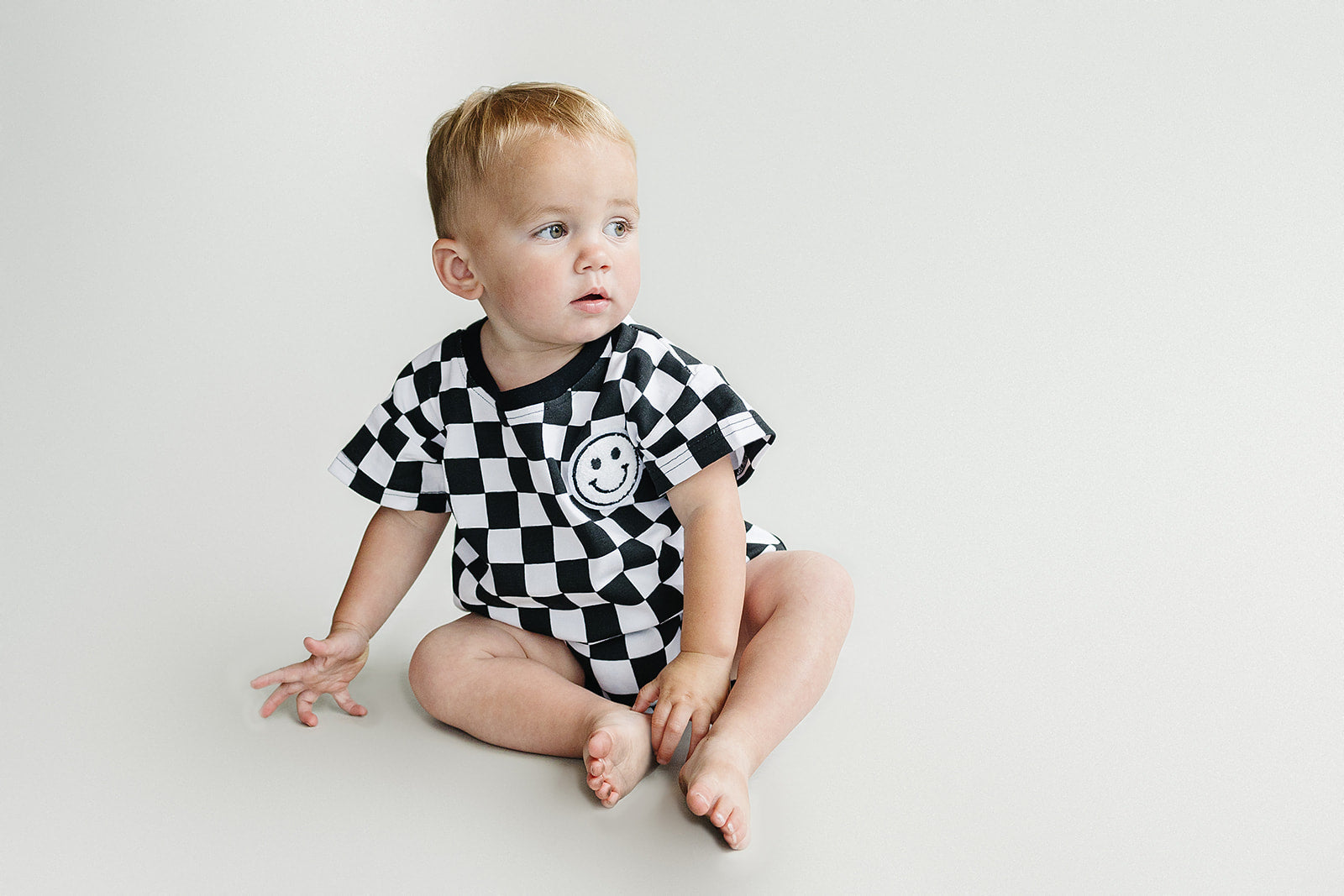 Checkered Smiley Black Short Sleeve Bubble Romper