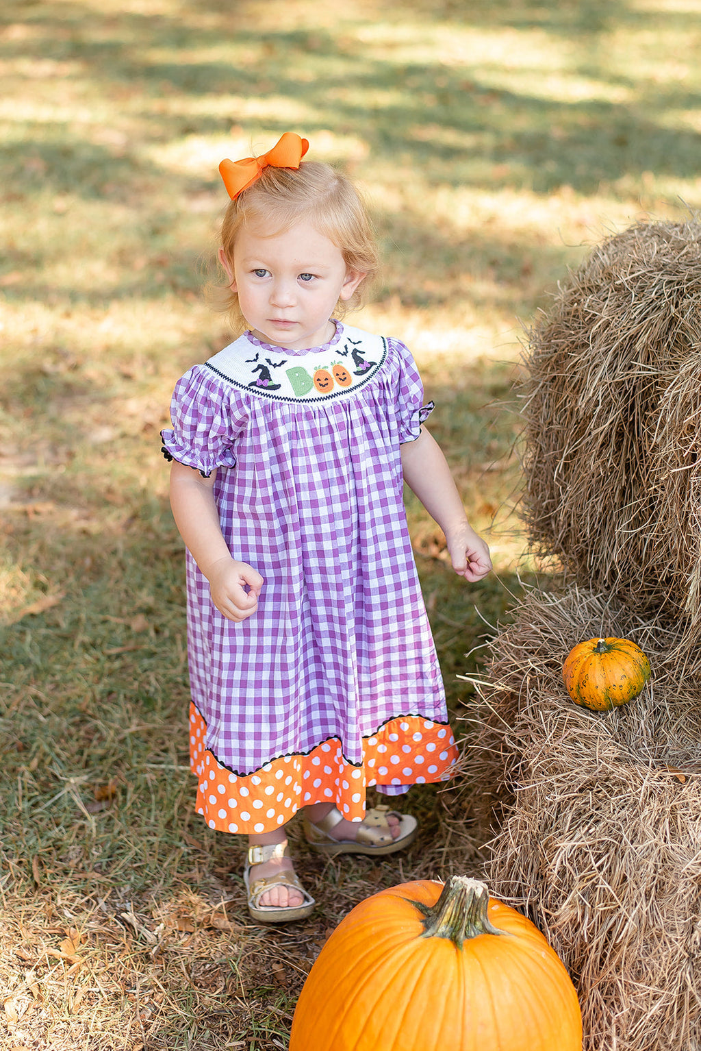 Girls Purple Gingham Halloween Boo Smocked Bishop Dress - toddler modeling dress