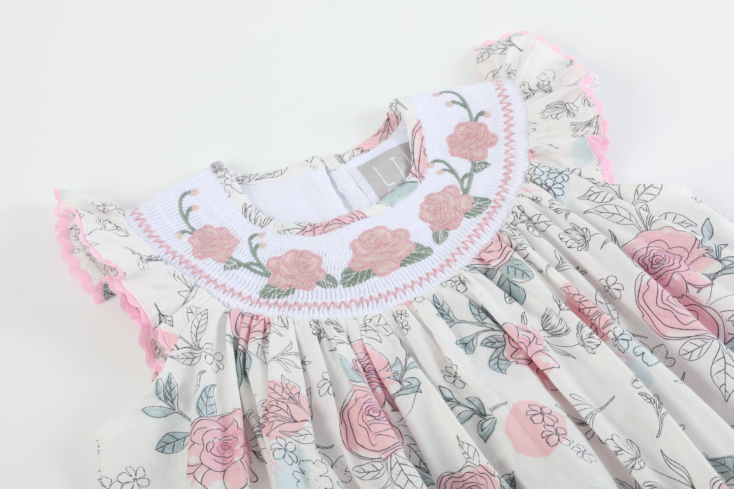 Girls’ White and Pink Floral Smocked Bishop Dress