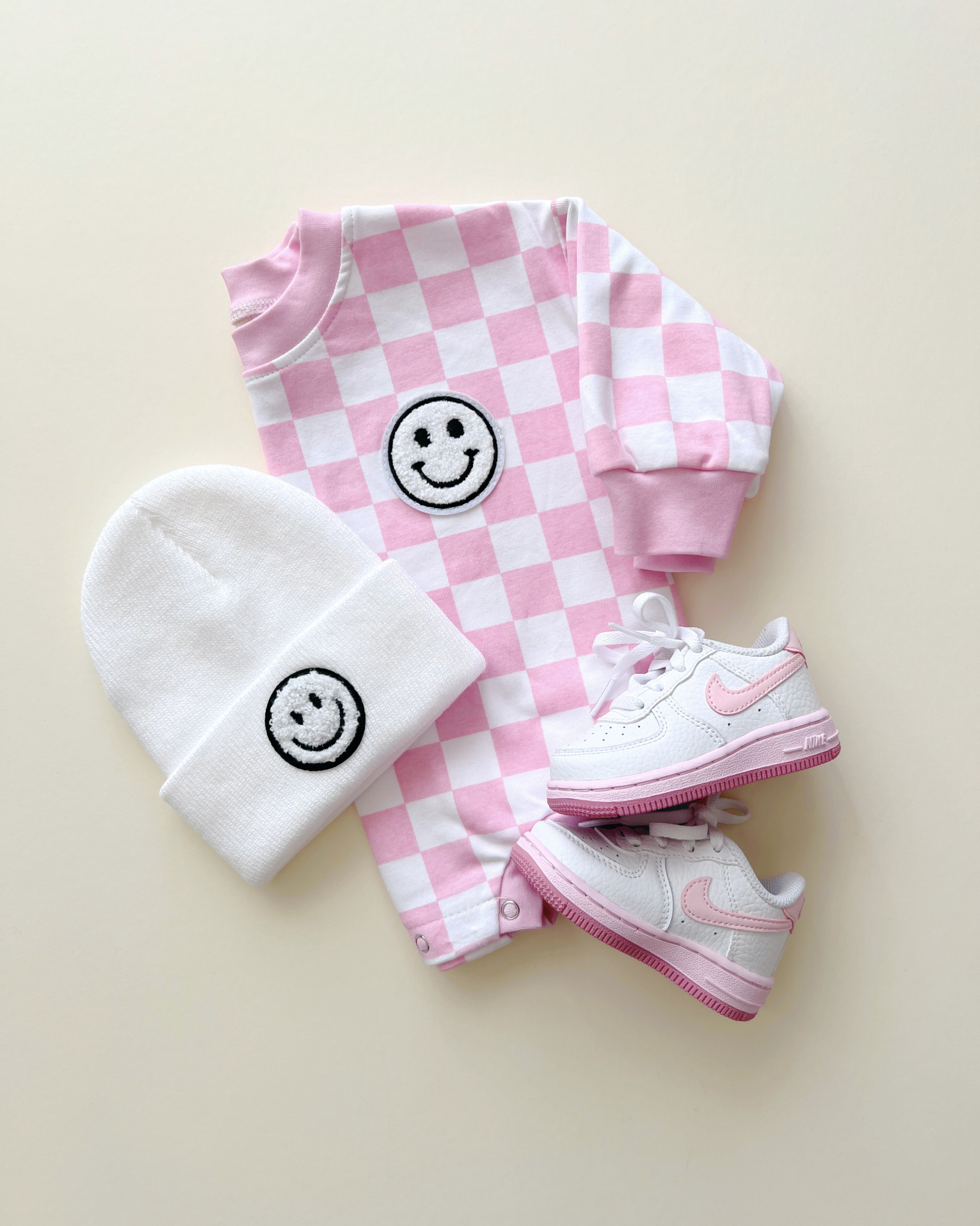 Checkered Smiley Pink Bubble Romper