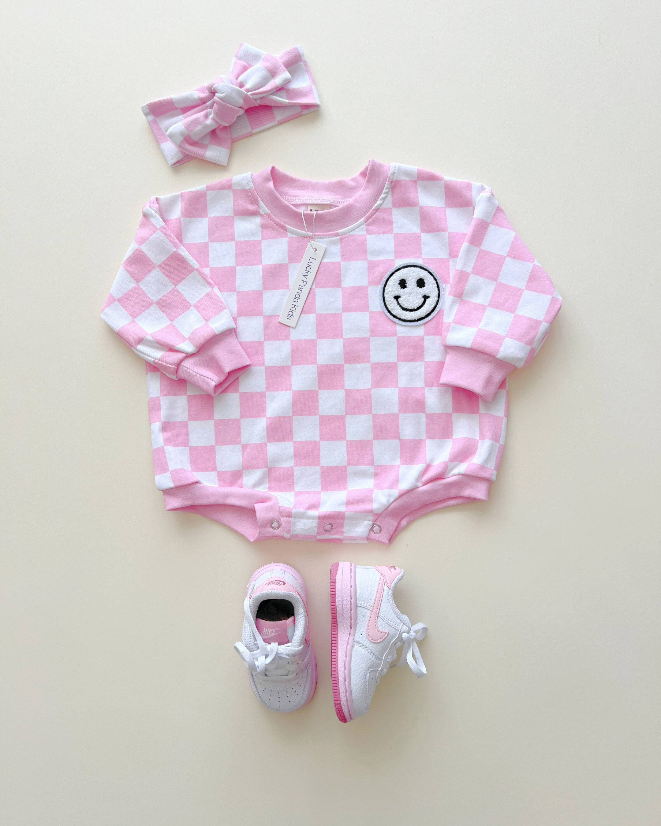 Checkered Smiley Pink Bubble Romper