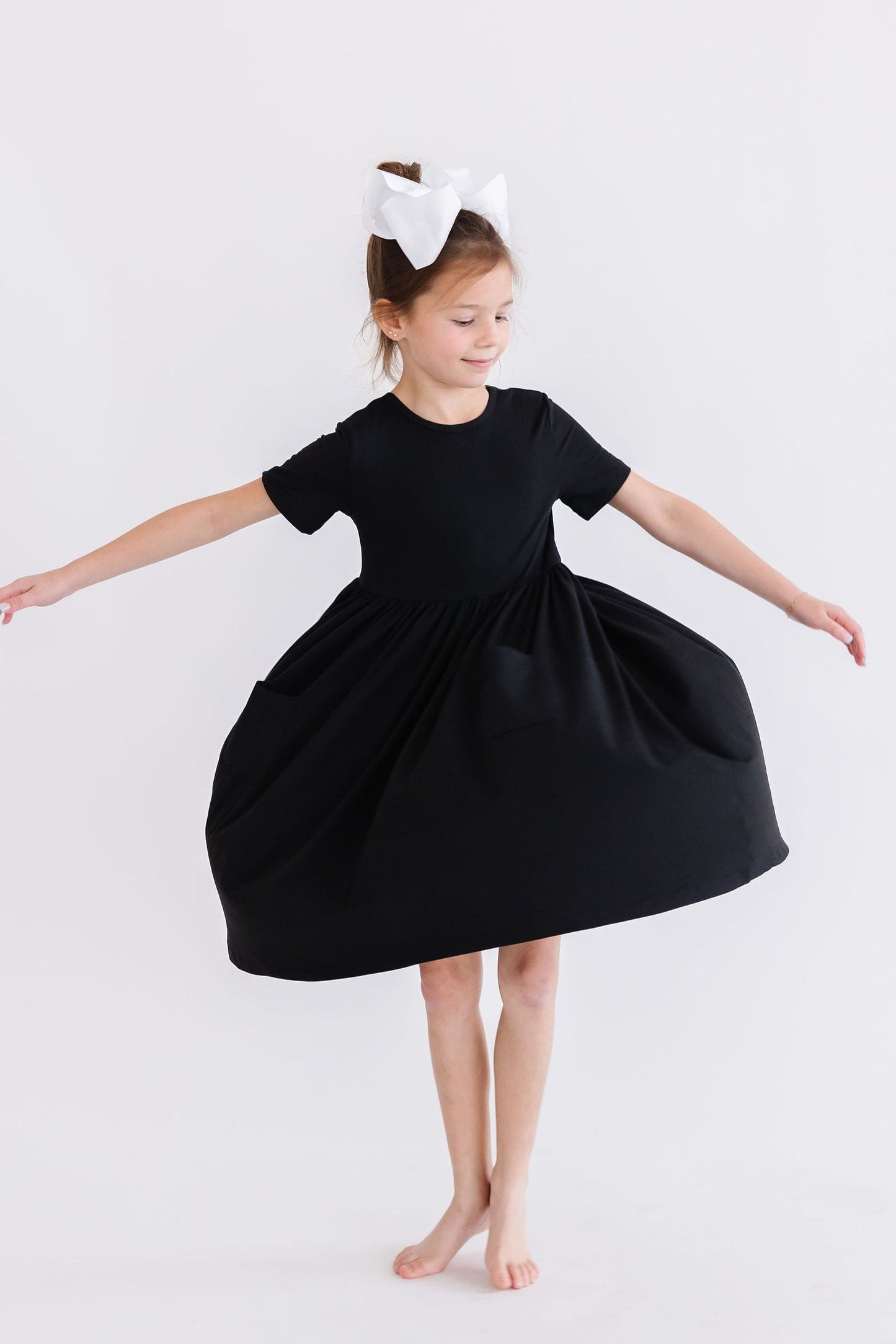 Girls Black Twirl Dress with Pockets