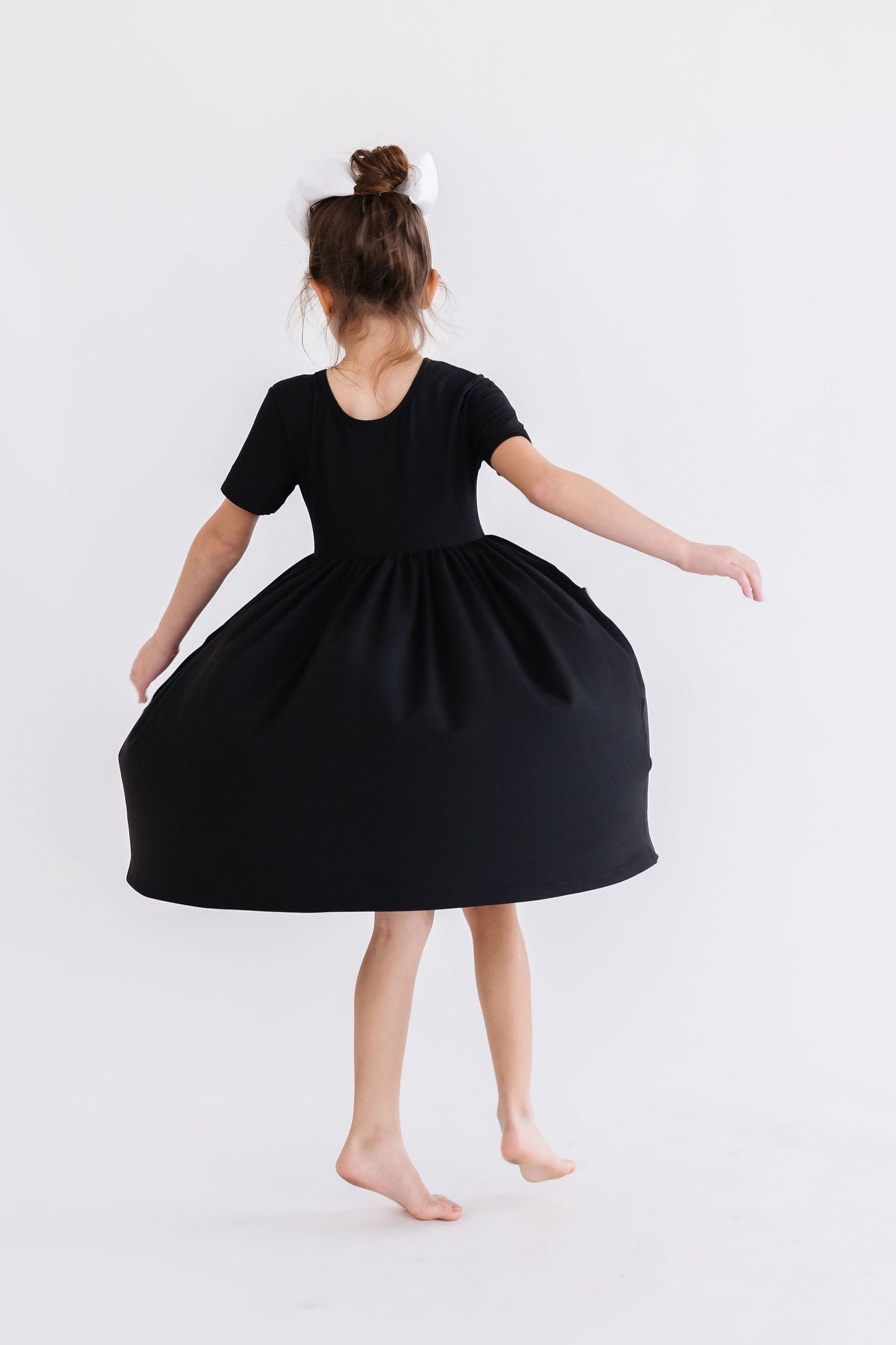 Girls Black Twirl Dress with Pockets