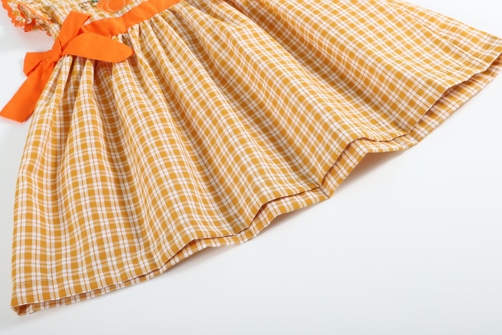 Girls Orange Gingham Ruffle Dress with Pumpkin Appliqué and Bow Accents