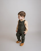 Elegant Forest Green Corduroy Boy Overalls with yellow gingham trim and wooden buttons, ideal for stylish fall and holiday wear by Cuclie