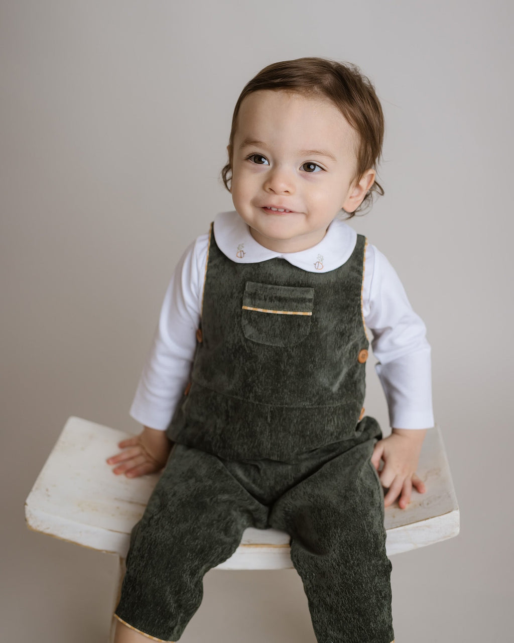 Elegant Forest Green Corduroy Boy Overalls with yellow gingham trim and wooden buttons, ideal for stylish fall and holiday wear by Cuclie