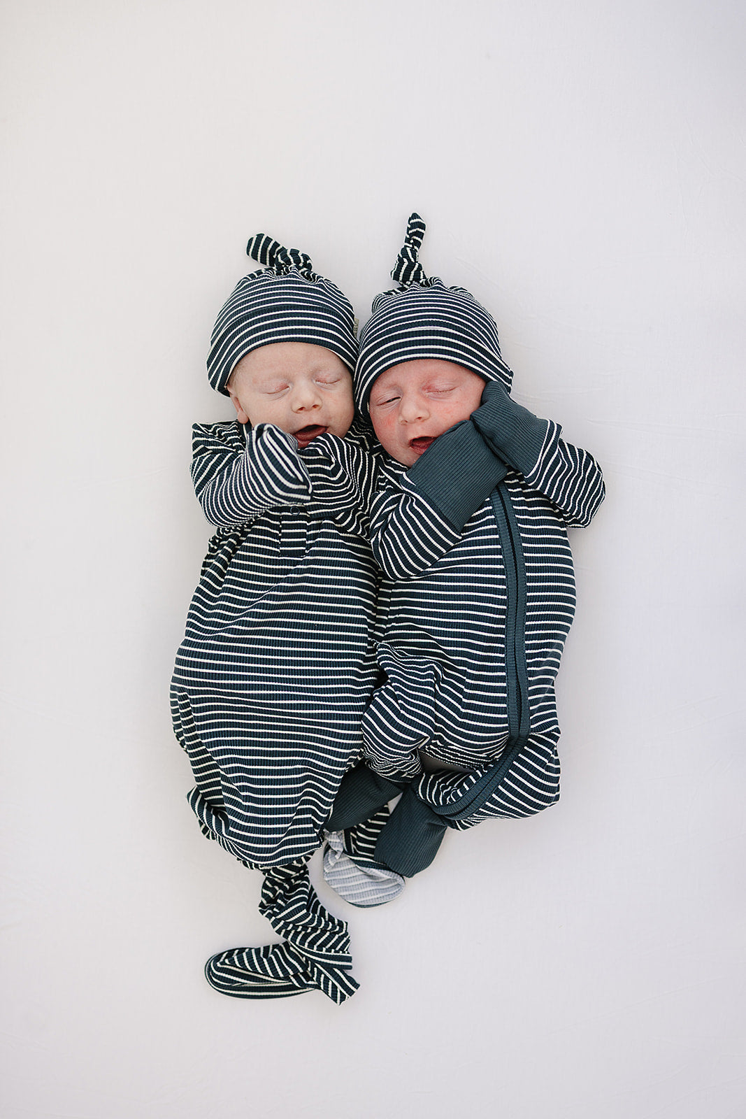 navy stripes bamboo knot gown styled with matching hat and swaddle