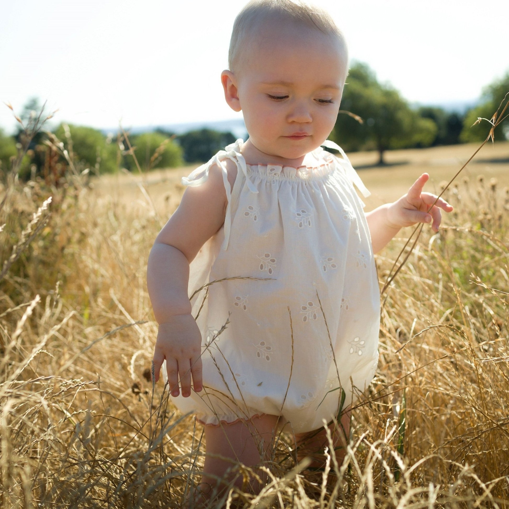 Baby Girl Off - white Eyelet Strap Romper - Blissfully Lavender BoutiqueBeet World