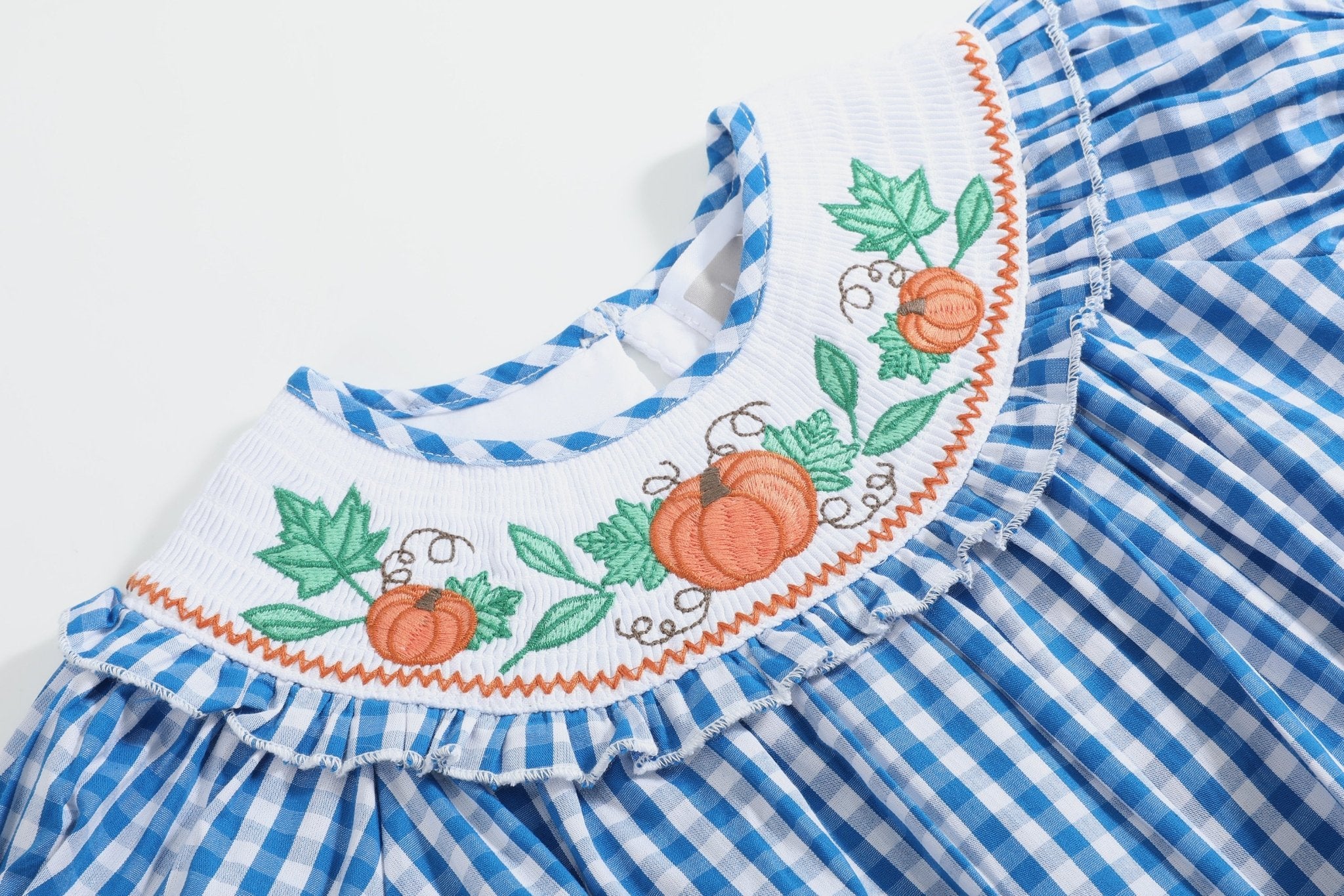 Blue Gingham Pumpkin Smocked Ruffle Romper