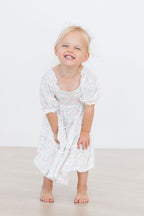Cloud 9 Smocked Ruffle Dress - Blissfully Lavender BoutiqueMila & Rose ®