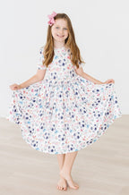 girls soccer print twirl dress with short sleeves and pockets