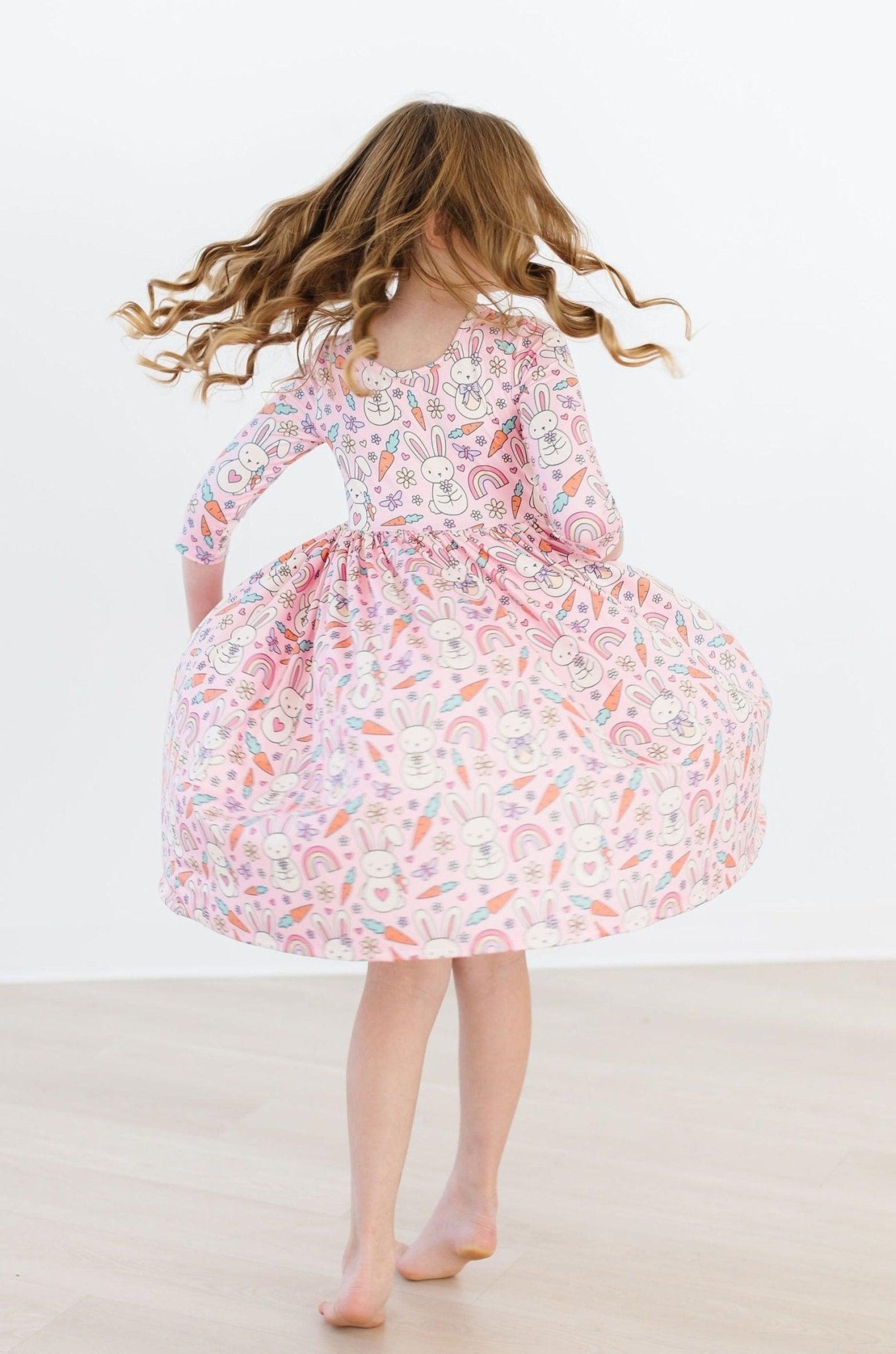 close-up of bunny print and scoop back neckline