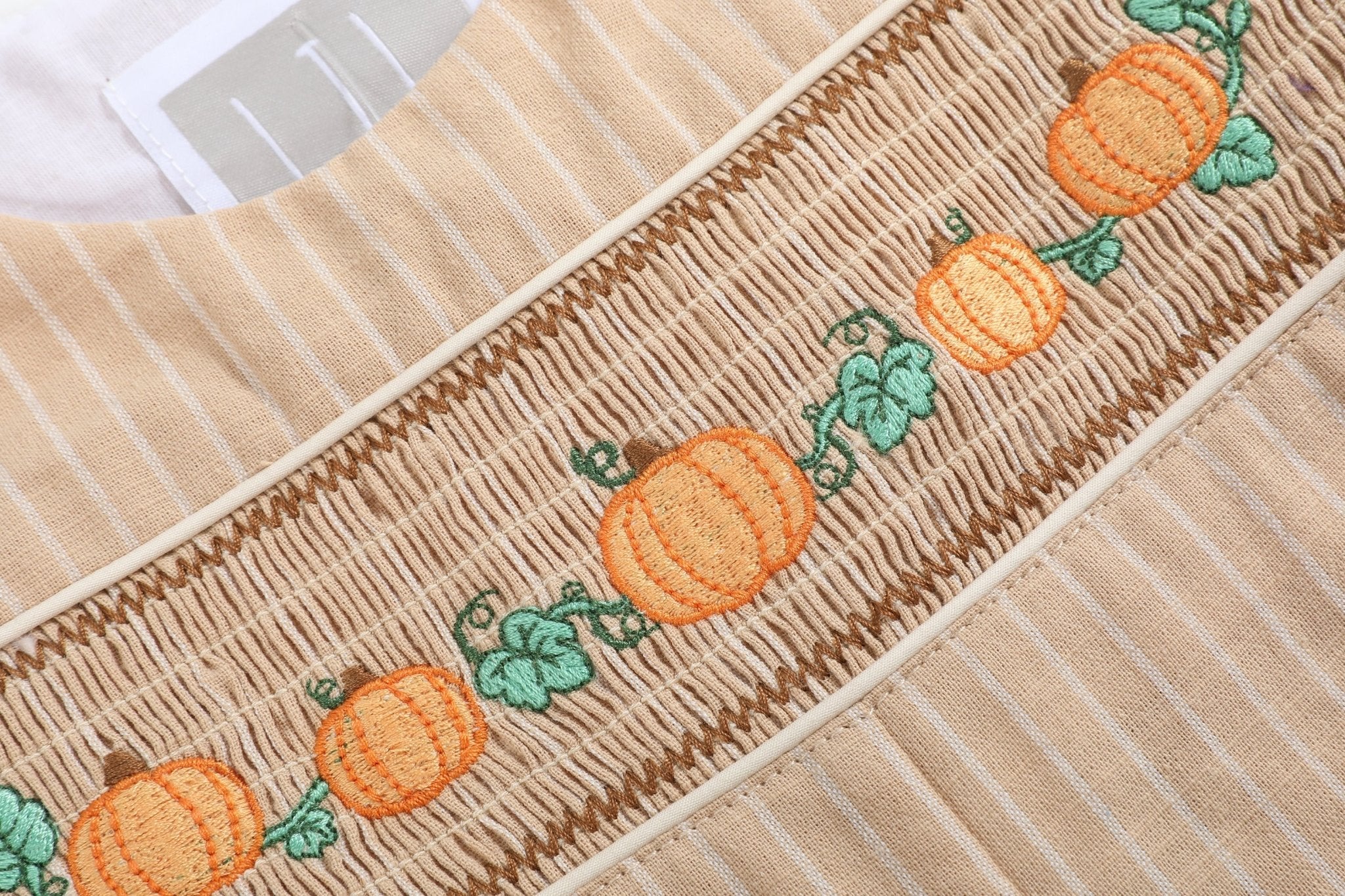 Light Brown Pinstripe Pumpkin Smocked Overalls