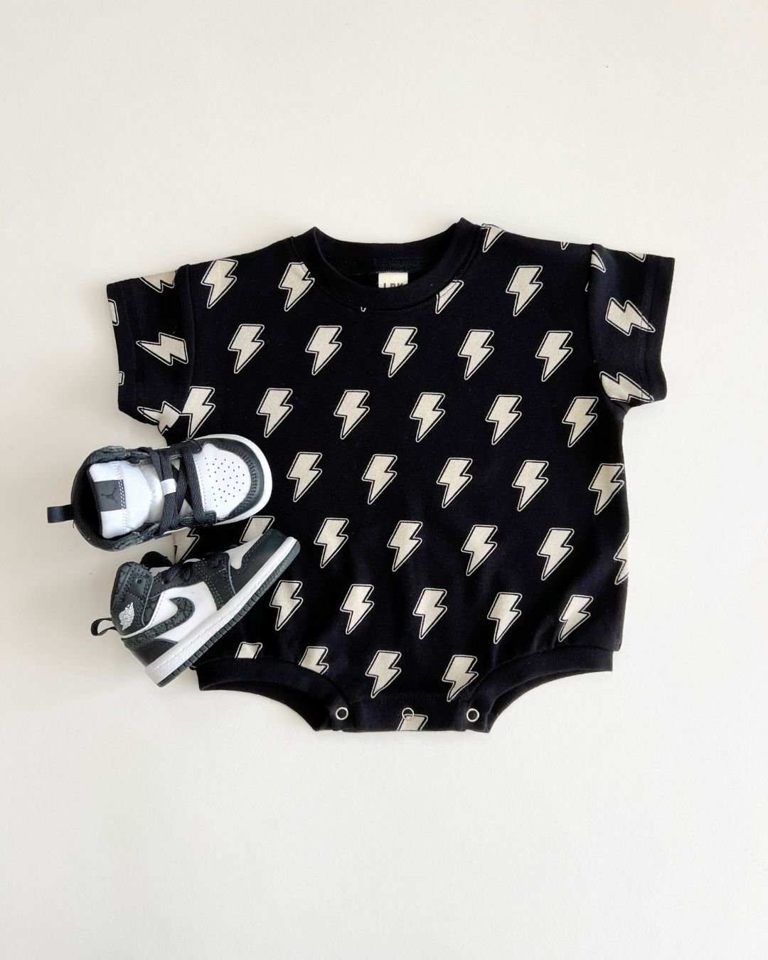 Black Bolts Short Sleeve Bubble Romper