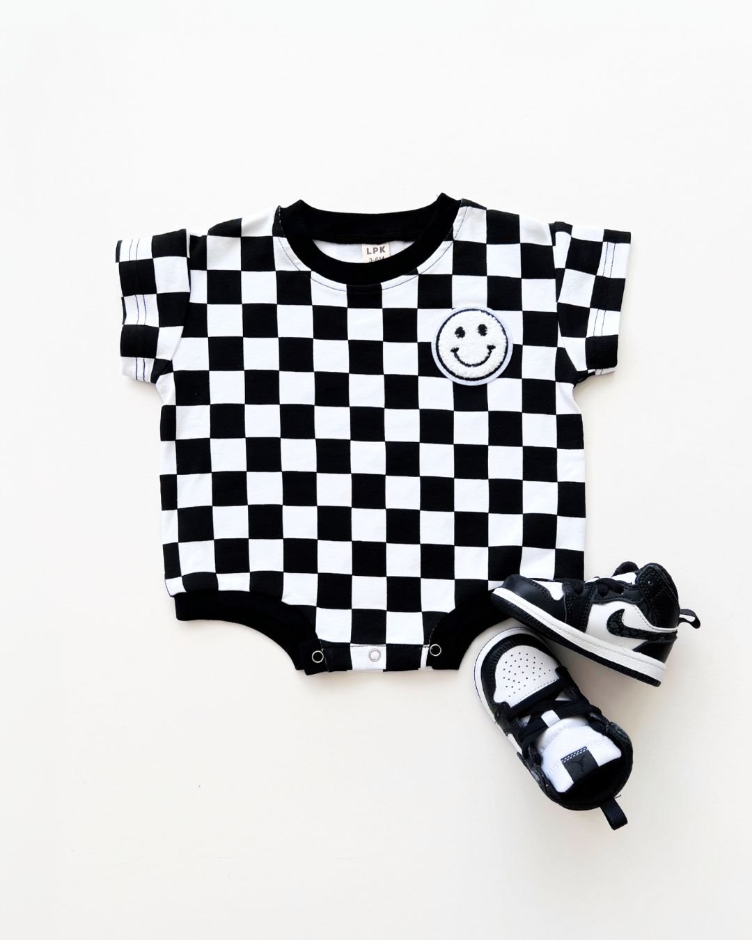 Checkered Smiley Black Short Sleeve Bubble Romper