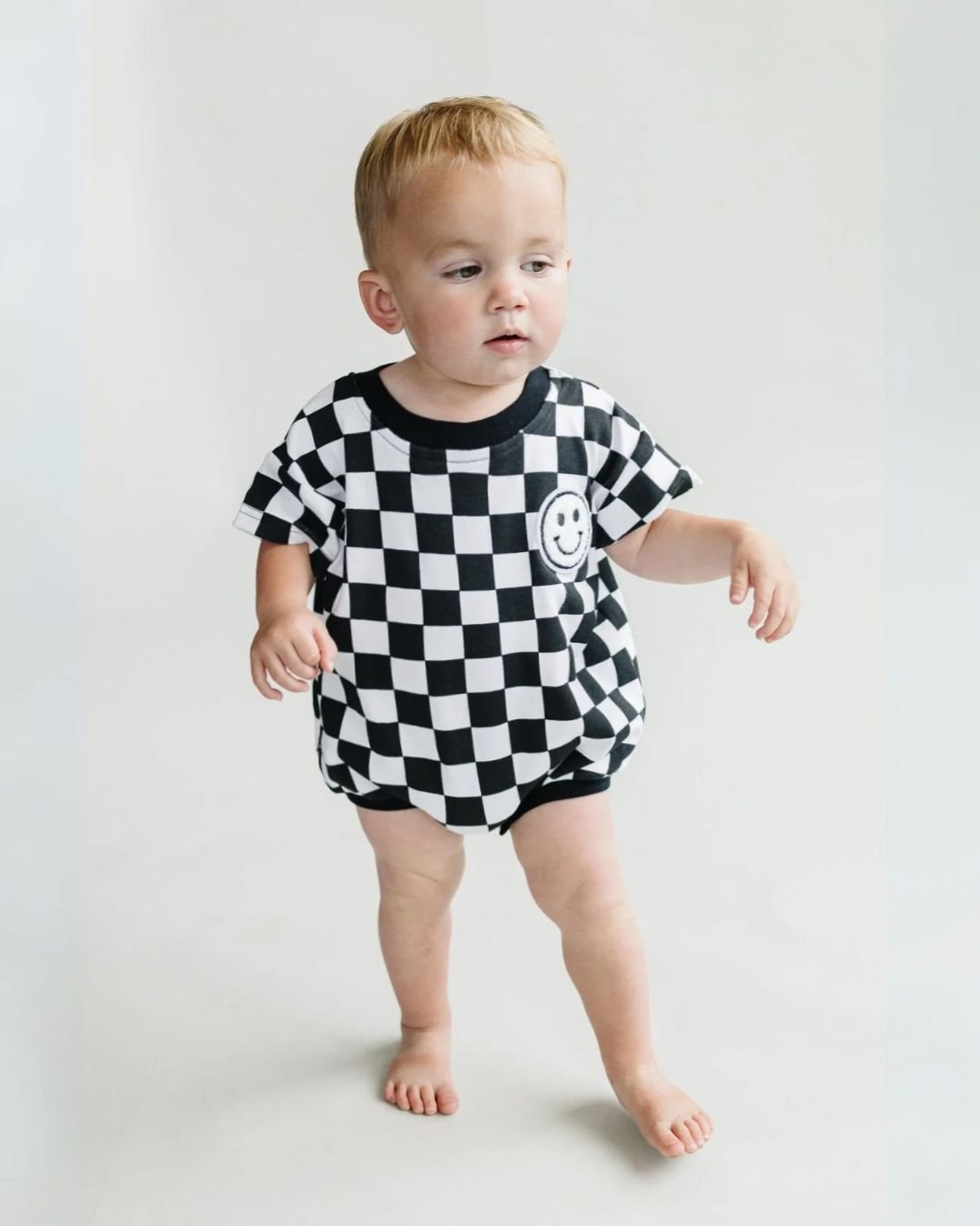 Checkered Smiley Black Short Sleeve Bubble Romper