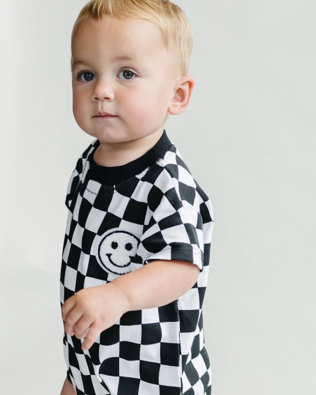 Checkered Smiley Black Short Sleeve Bubble Romper