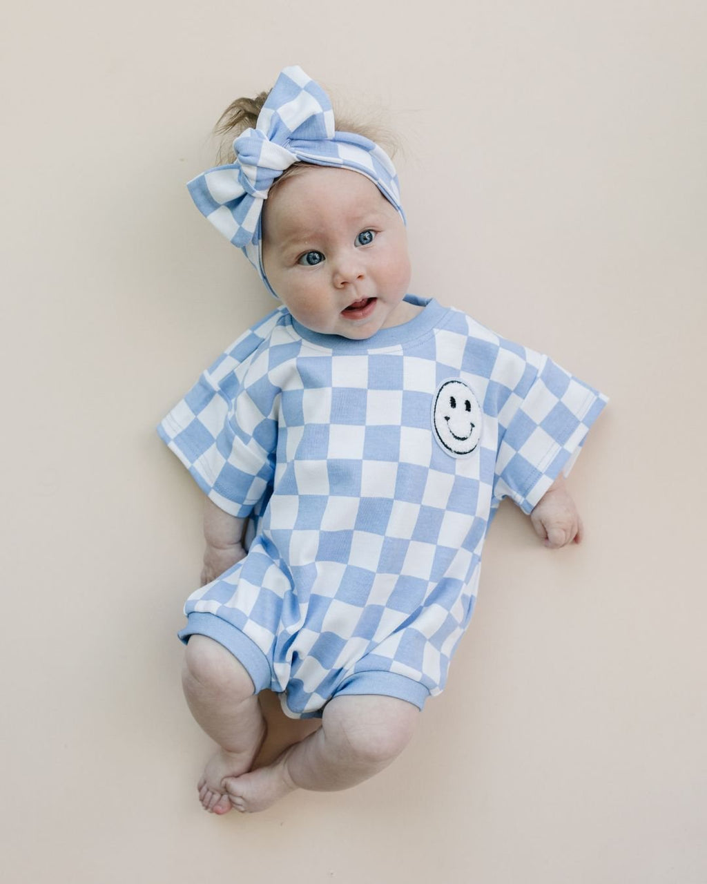 Checkered Smiley Blue Short Sleeve Bubble Romper
