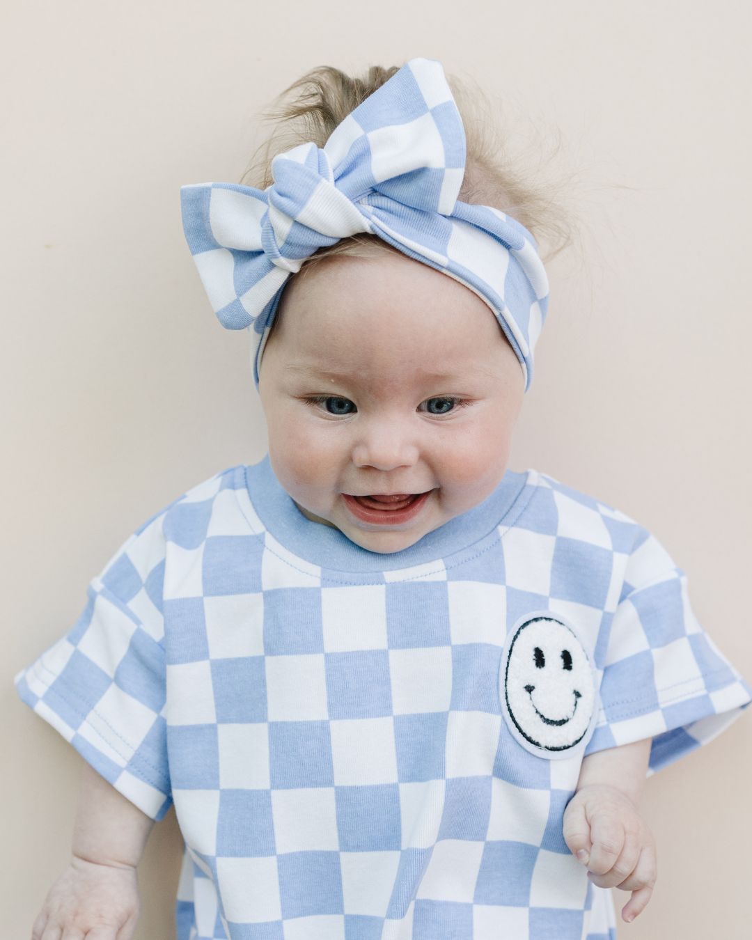 Checkered Smiley Blue Short Sleeve Bubble Romper