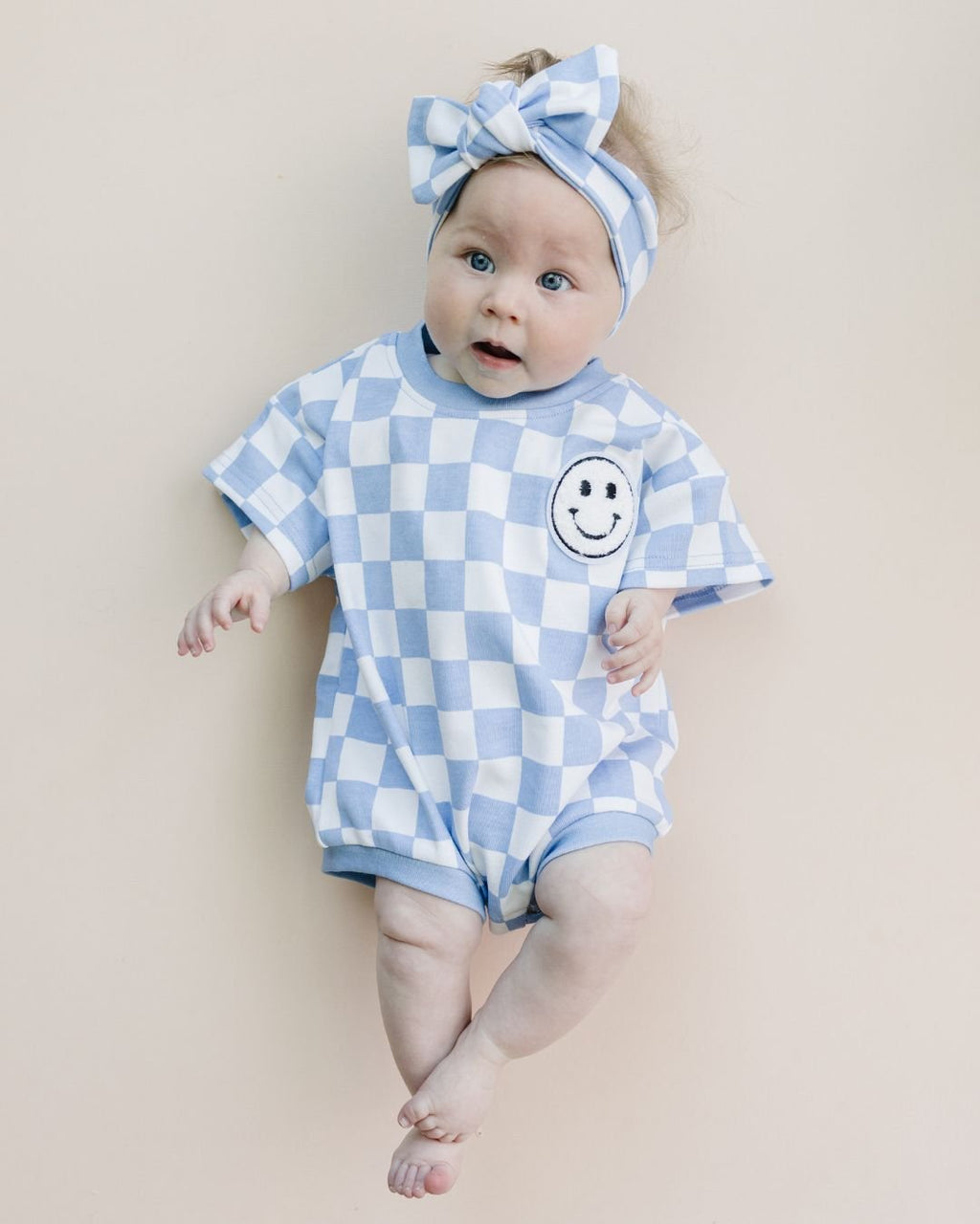 Checkered Smiley Blue Short Sleeve Bubble Romper