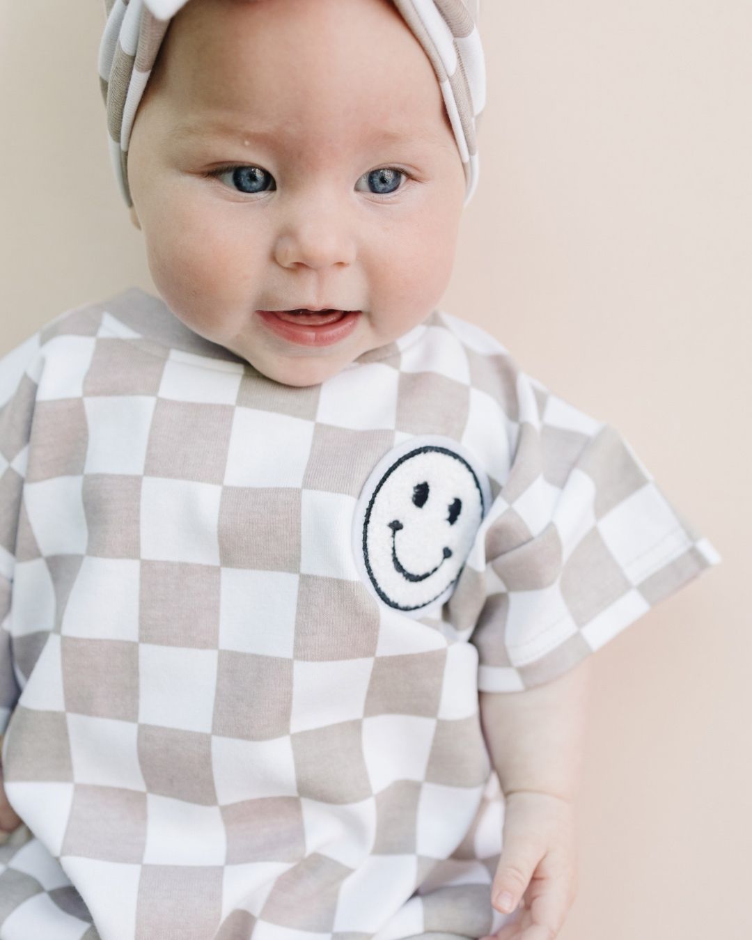 Latte Checkered Smiley Short Sleeve Bubble Romper