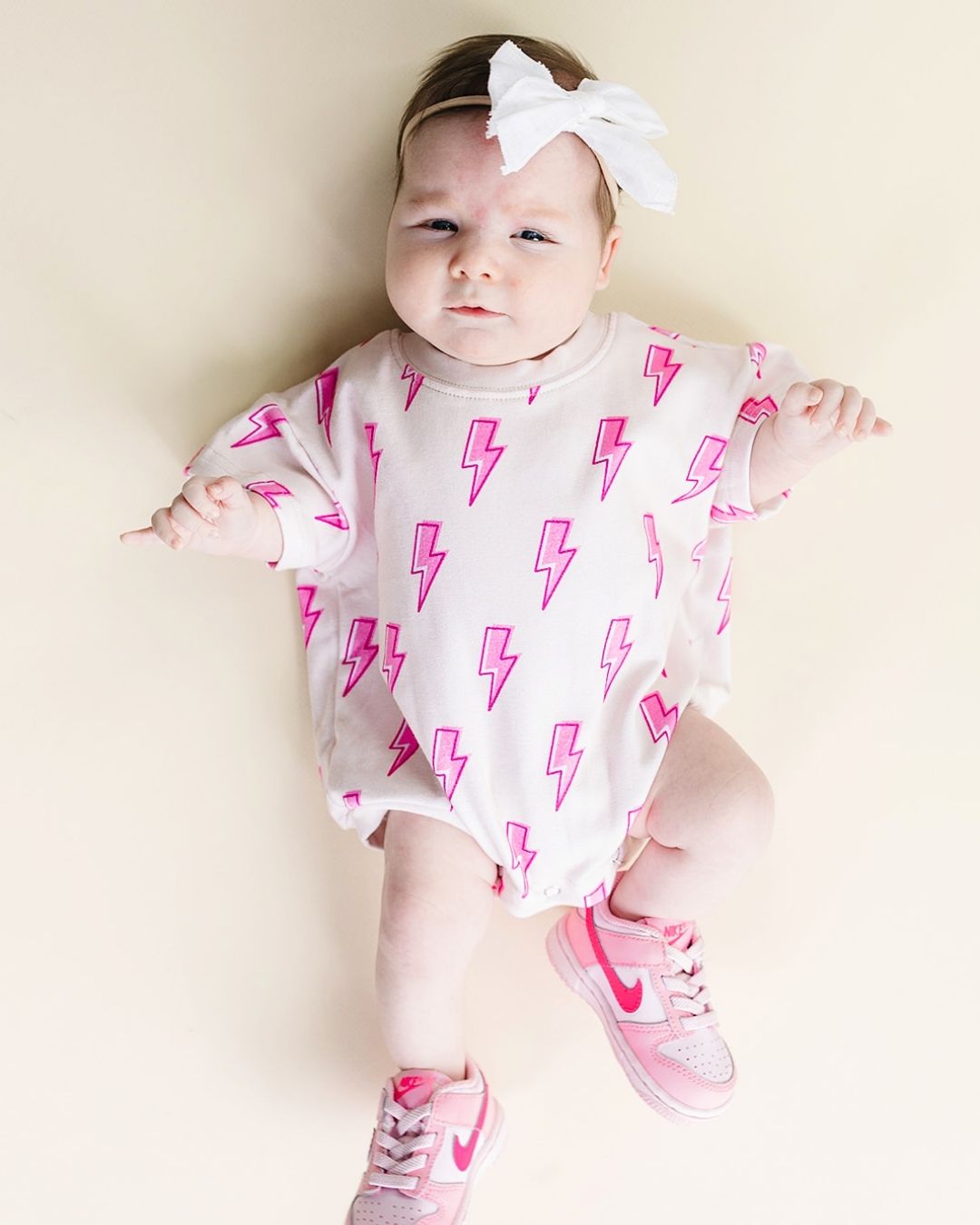 Pink Bolts Short Sleeve Bubble Romper
