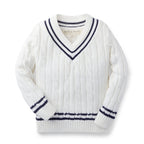 White sweater with navy accents on a white background