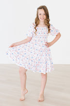 Vintage Flags Smocked Ruffle Dress - Blissfully Lavender BoutiqueMila & Rose ®