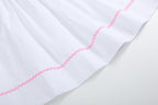 White and Pink Smocked Bishop Dress