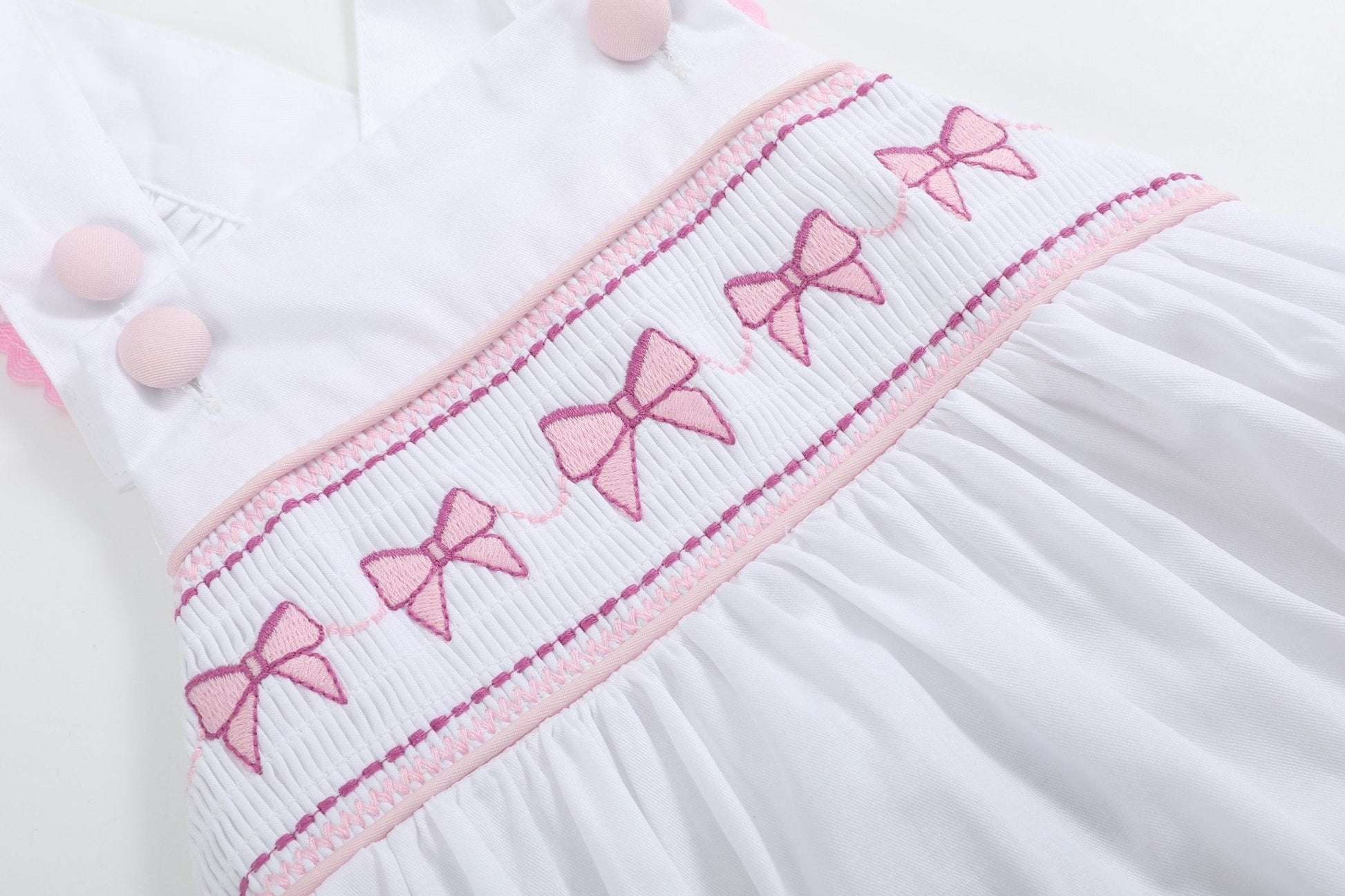 White & Pink Bows Smocked Ruffle Romper