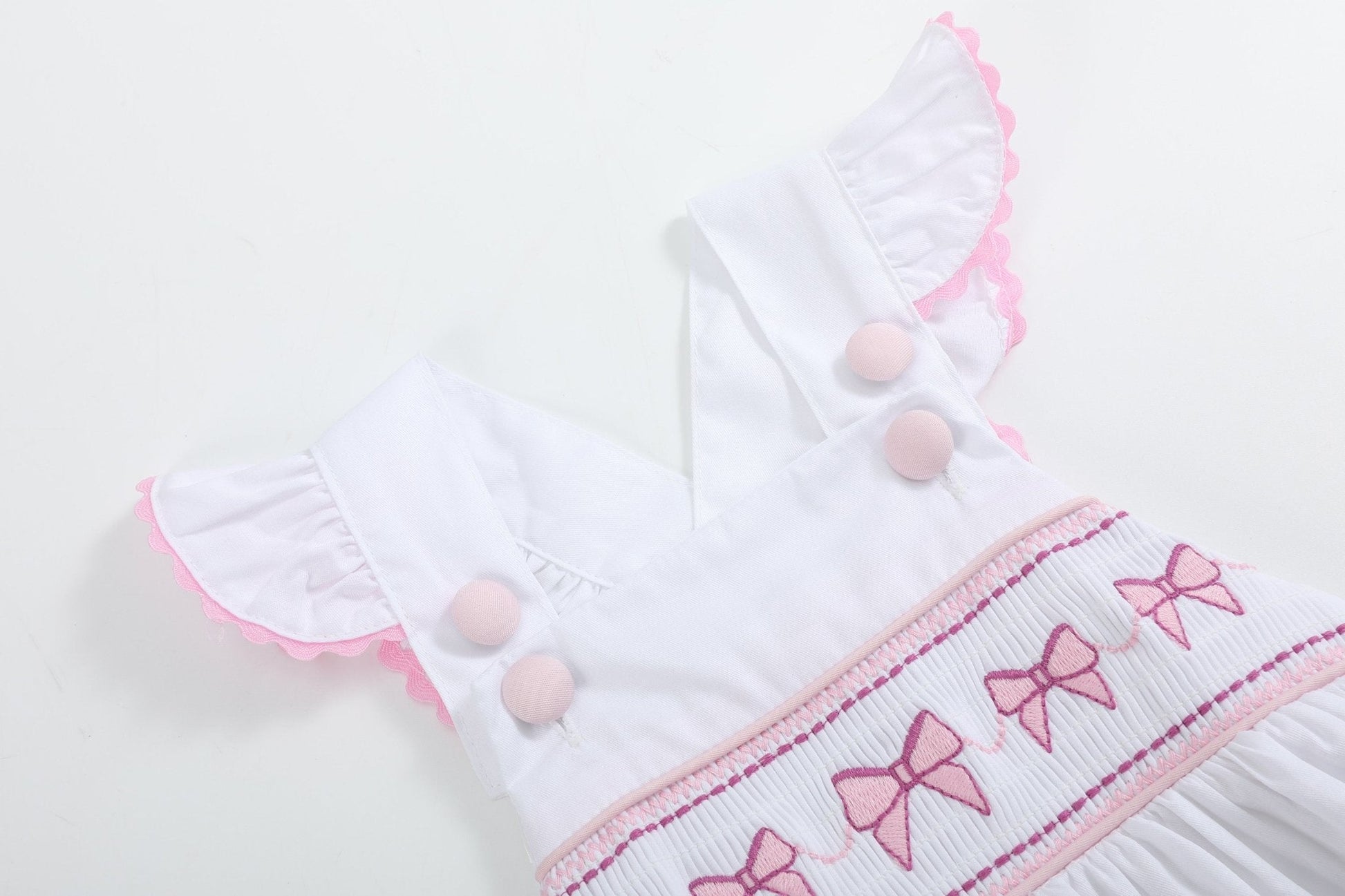 White & Pink Bows Smocked Ruffle Romper