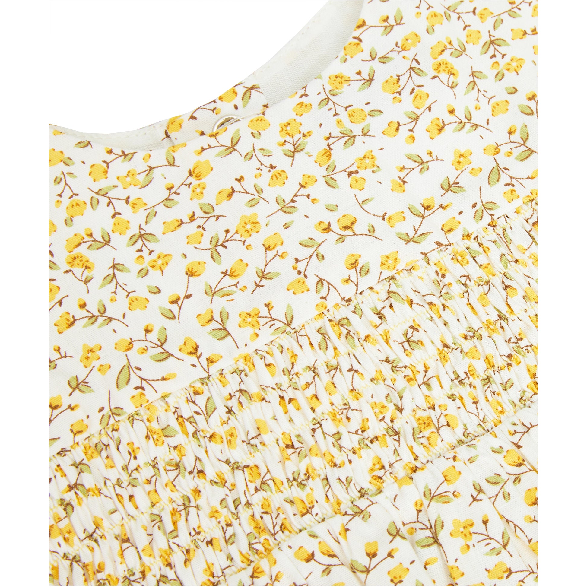 Close up of girls Top yellow floral tunic.